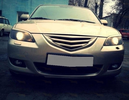 Mazda 3, Axela, седан 2004-2009 Решетка радиатора, "Корнер"