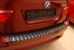 Накладки на задний бампер с загибом Alufrost  BMW X3 I (E83) FL (2007-2010) carbon