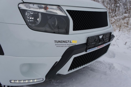 2011 -  Renault Duster Накл.на противотум. фары (LED) ABS пластик , с тиснением, глянцевое исполнениеНакладки на передний бампер 2 шт., комплект ДХО
